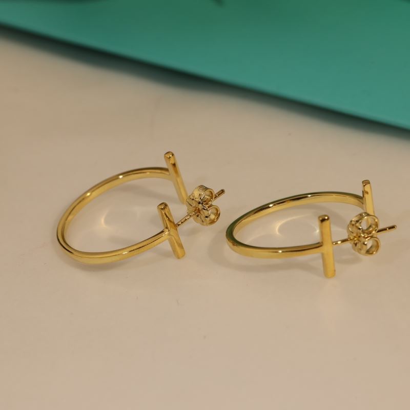 T*f*ny earrings